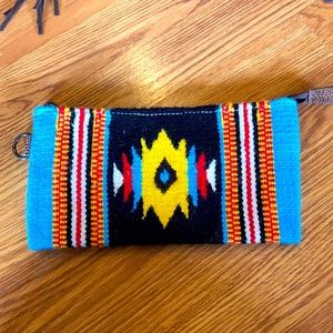 American Darling saddle blanket wristlet.